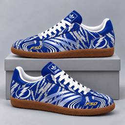 Tampa Bay Lightning | Premium NHL F50 Tiger Print Low Top Sneakers with Fierce Striped Design and Classic Gum Sole NDN cover