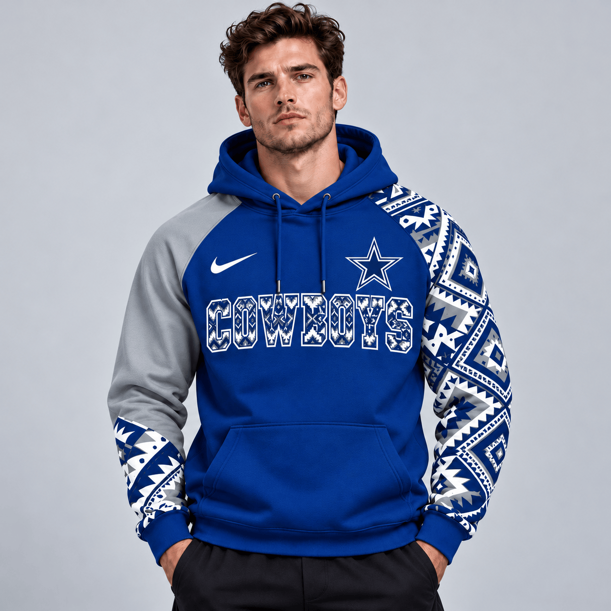 Dallas Cowboys | Premium NFL Aztec Inspired Colorblock Pullover Hoodie With Asymmetric Sleeves And Bold Team Lettering NDN cover