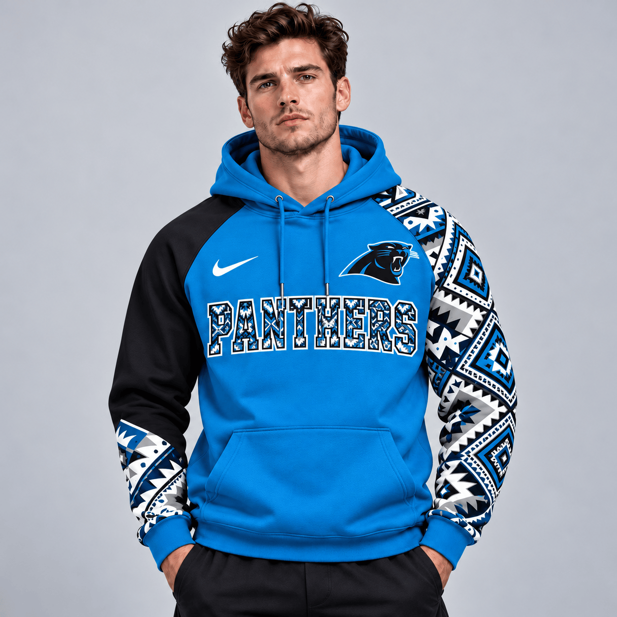 Carolina Panthers | Premium NFL Aztec Inspired Colorblock Pullover Hoodie With Asymmetric Sleeves And Bold Team Lettering NDN cover