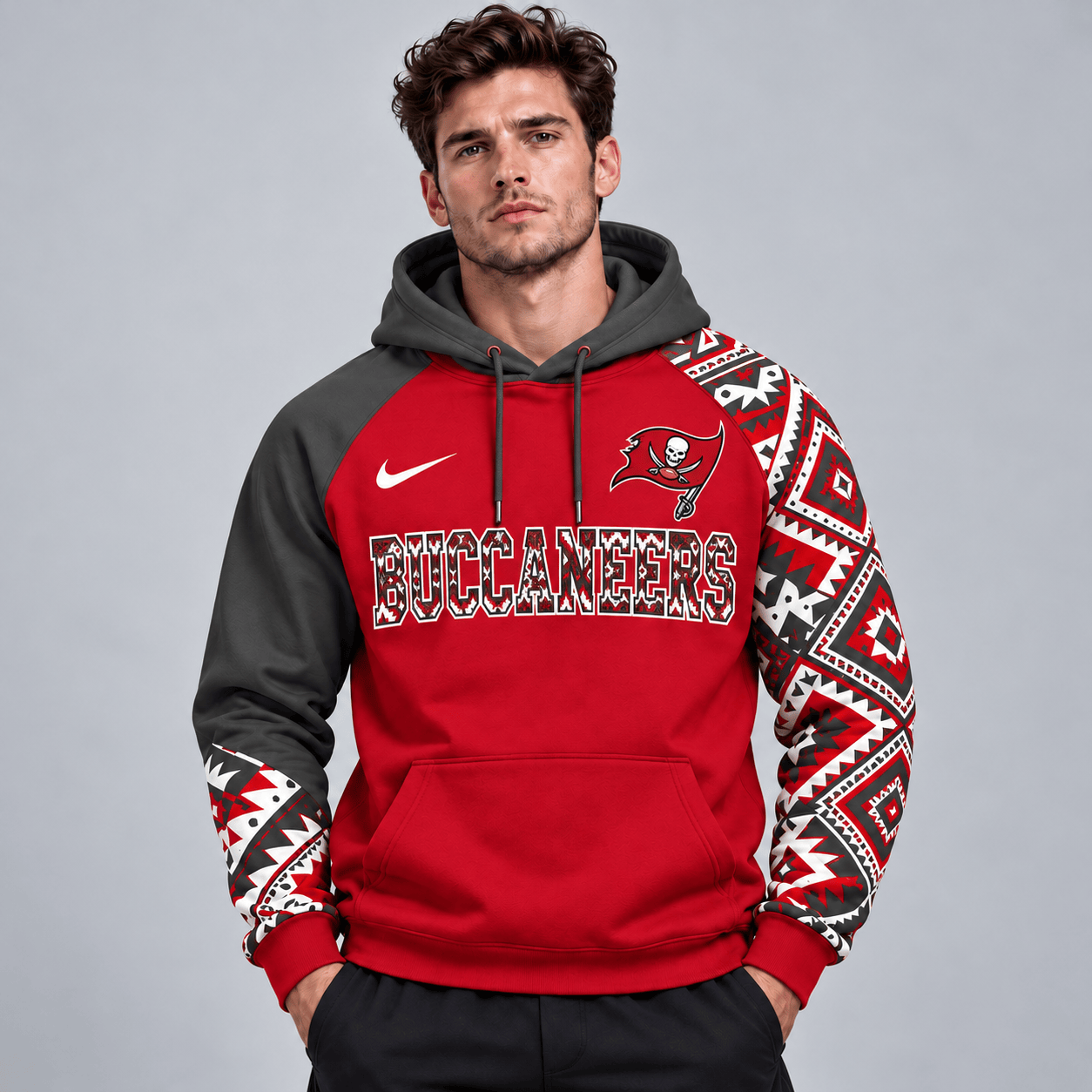 Tampa Bay Buccaneers | Premium NFL Aztec Inspired Colorblock Pullover Hoodie With Asymmetric Sleeves And Bold Team Lettering NDN cover