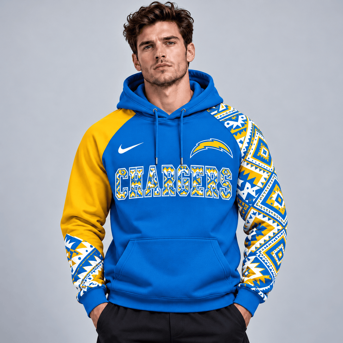 Los Angeles Chargers | Premium NFL Aztec Inspired Colorblock Pullover Hoodie With Asymmetric Sleeves And Bold Team Lettering NDN cover