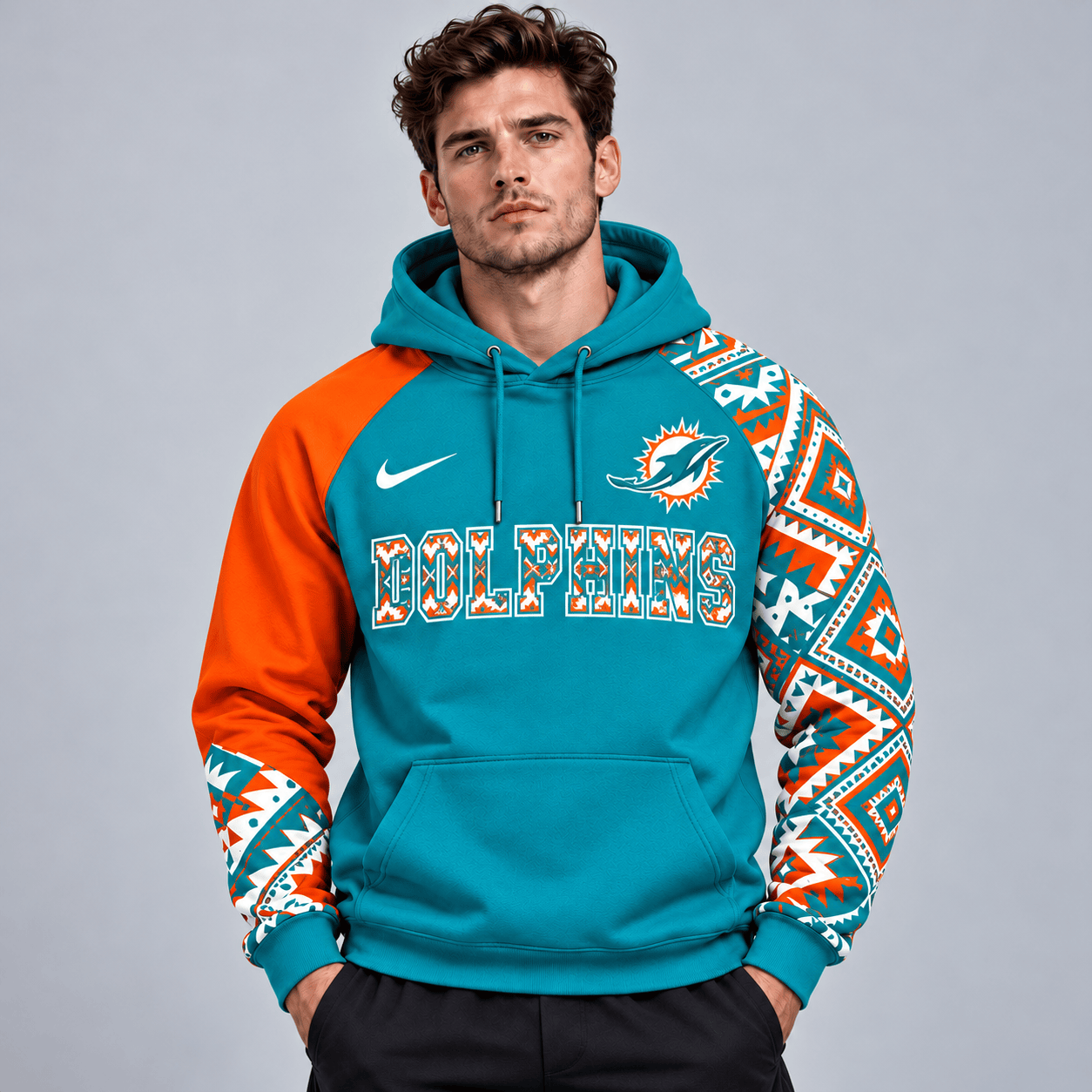 Miami Dolphins | Premium NFL Aztec Inspired Colorblock Pullover Hoodie With Asymmetric Sleeves And Bold Team Lettering NDN cover