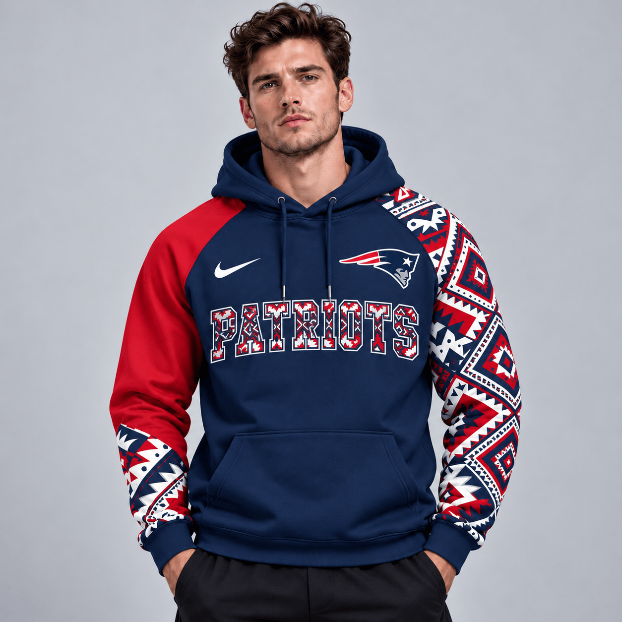 New England Patriots | Premium NFL Aztec Inspired Colorblock Pullover Hoodie With Asymmetric Sleeves And Bold Team Lettering NDN cover