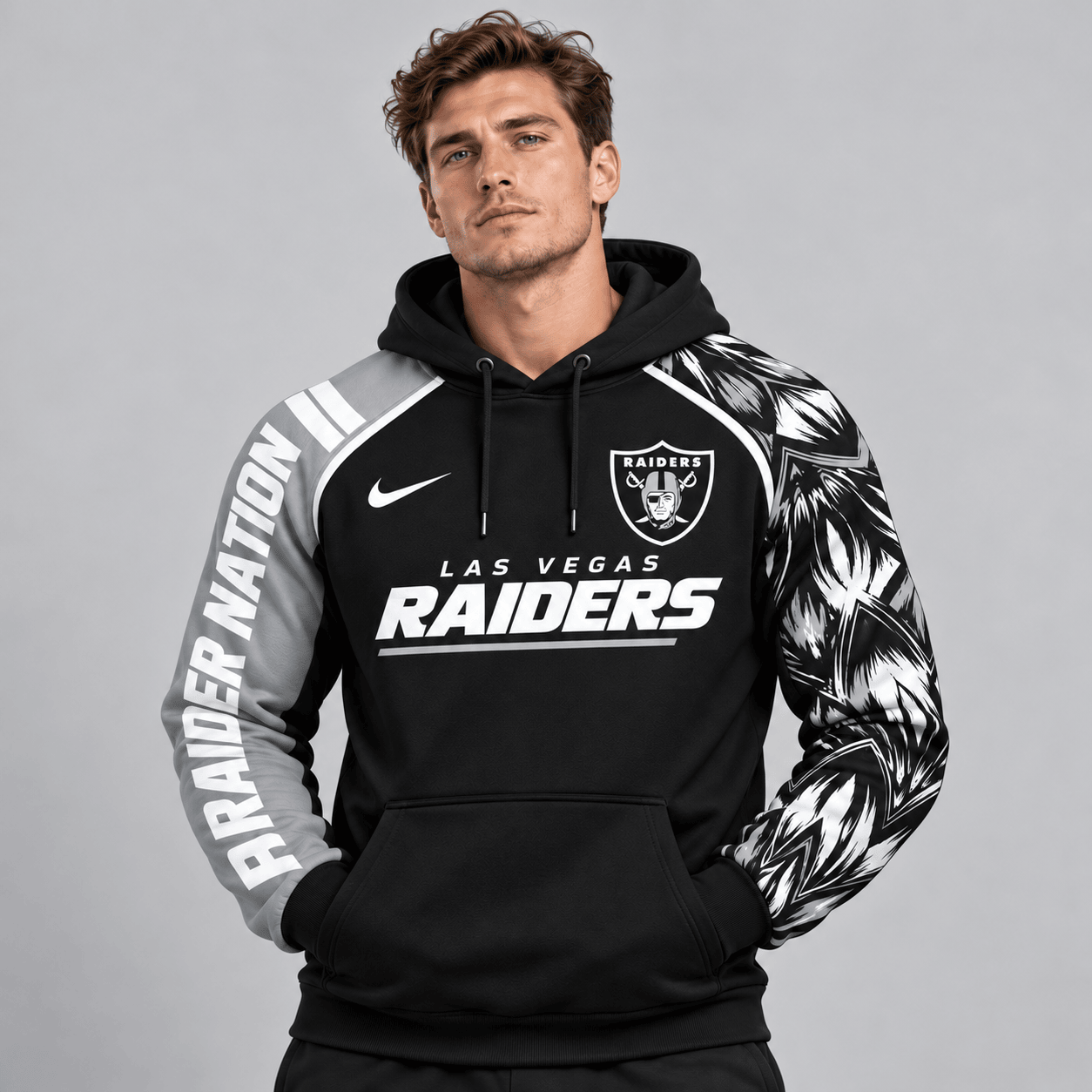 Las Vegas Raiders | Premium NFL Dynamic Brushstroke Graphic Asymmetric Sleeve Pullover Hoodie With Team Logo And Bold Lettering NDN cover
