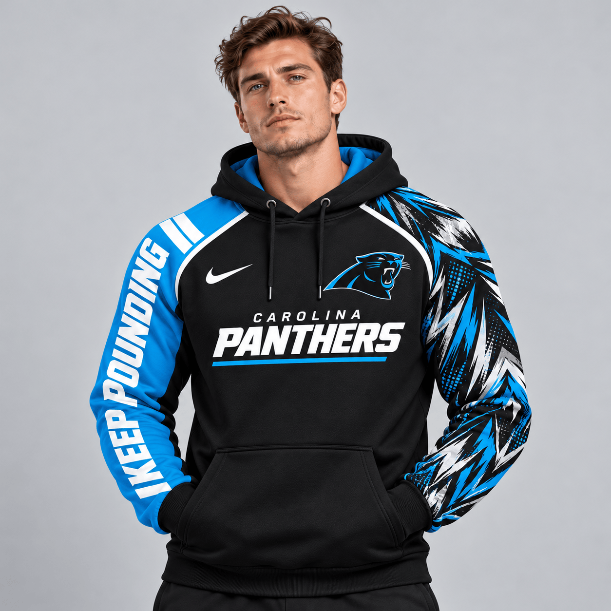Carolina Panthers | Premium NFL Dynamic Brushstroke Graphic Asymmetric Sleeve Pullover Hoodie With Team Logo And Bold Lettering NDN cover