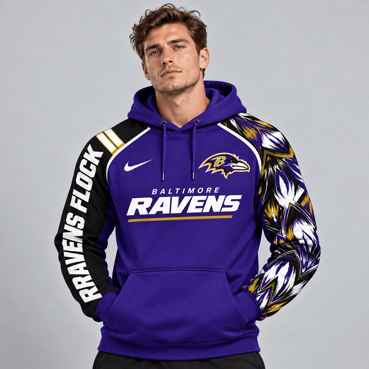 Baltimore Ravens | Premium NFL Dynamic Brushstroke Graphic Asymmetric Sleeve Pullover Hoodie With Team Logo And Bold Lettering NDN cover