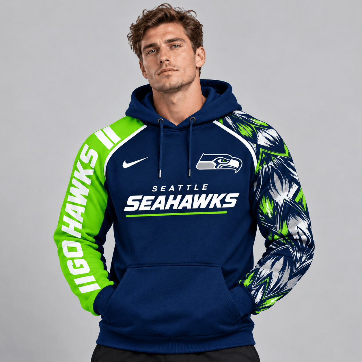 Seattle Seahawks | Premium NFL Dynamic Brushstroke Graphic Asymmetric Sleeve Pullover Hoodie With Team Logo And Bold Lettering NDN cover