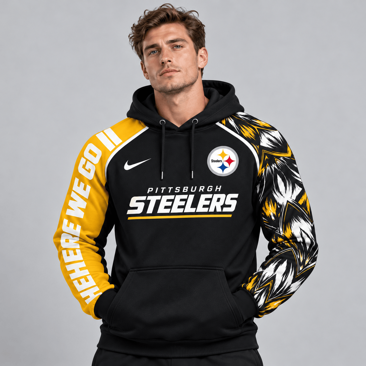 Pittsburgh Steelers | Premium NFL Dynamic Brushstroke Graphic Asymmetric Sleeve Pullover Hoodie With Team Logo And Bold Lettering NDN cover
