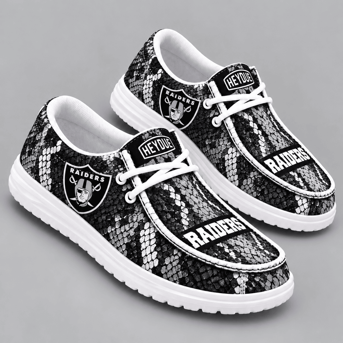 Las Vegas Raiders | Premium NFL Exotic Snakeskin Pattern HEYDUDE Casual Loafers With Team Logo And Lightweight Comfort Sole NDN cover