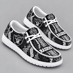 Las Vegas Raiders | Premium NFL Exotic Snakeskin Pattern HEYDUDE Casual Loafers With Team Logo And Lightweight Comfort Sole NDN cover