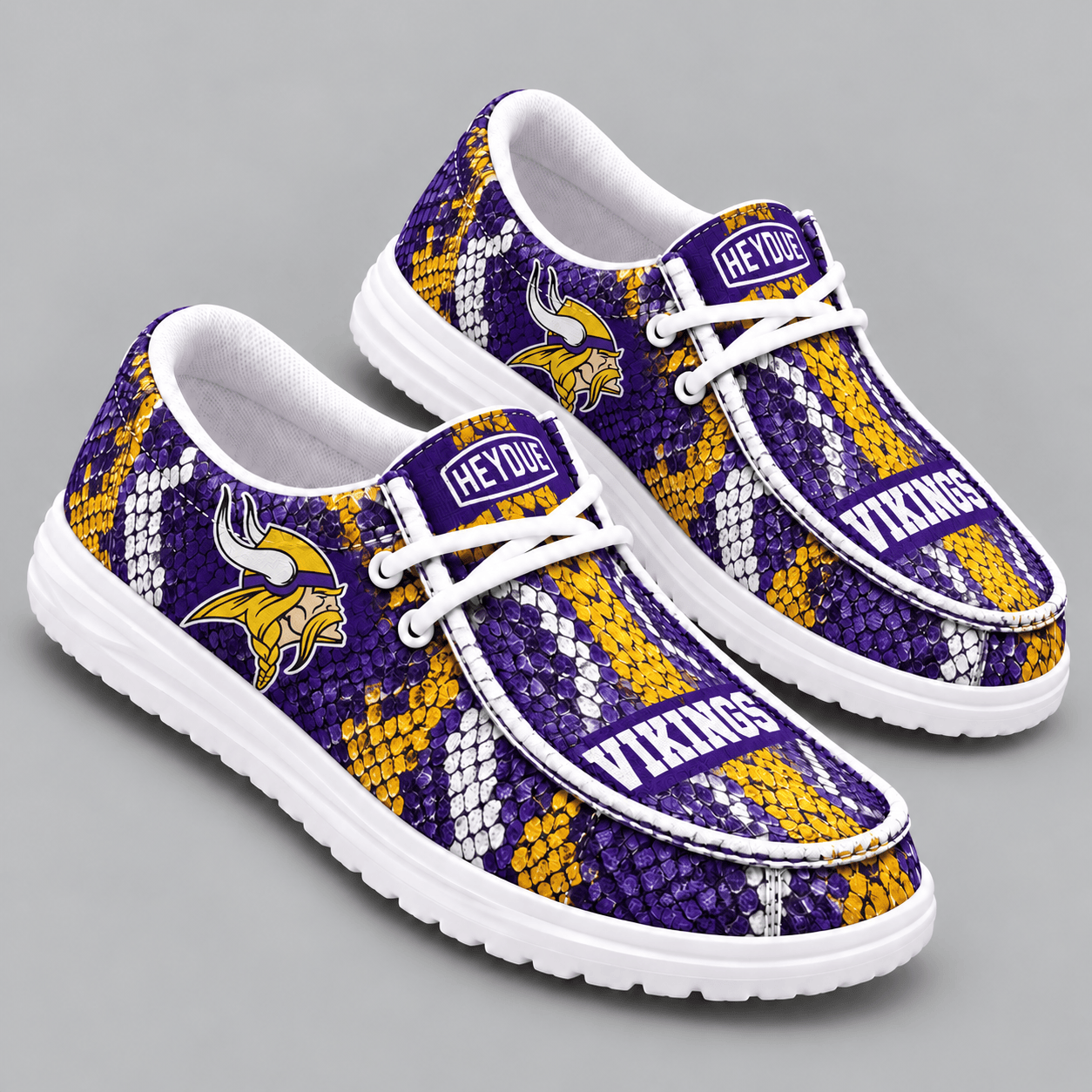 Minnesota Vikings | Premium NFL Exotic Snakeskin Pattern HEYDUDE Casual Loafers With Team Logo And Lightweight Comfort Sole NDN cover