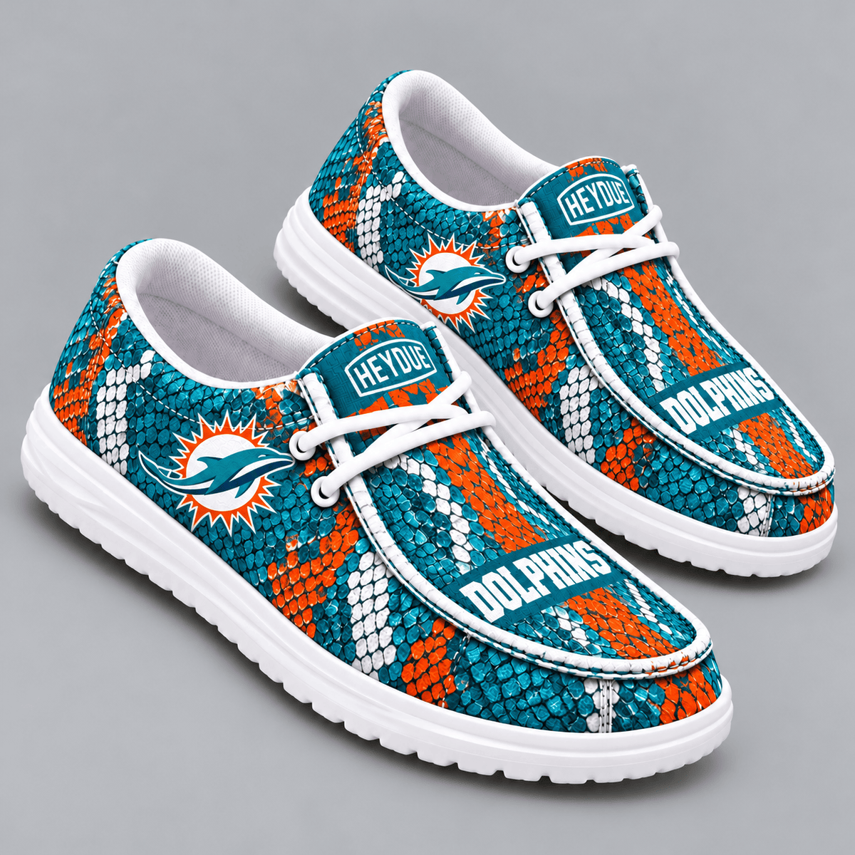 Miami Dolphins | Premium NFL Exotic Snakeskin Pattern HEYDUDE Casual Loafers With Team Logo And Lightweight Comfort Sole NDN cover