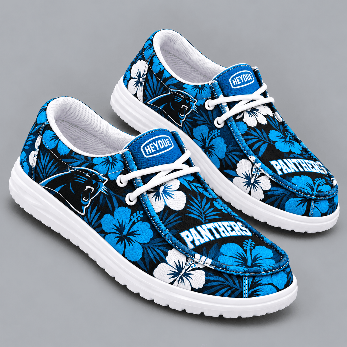 Carolina Panthers | Premium NFL Tropical Hibiscus Floral Print HEYDUDE Casual Loafers With Team Logo And Lightweight Comfort Sole NDN cover