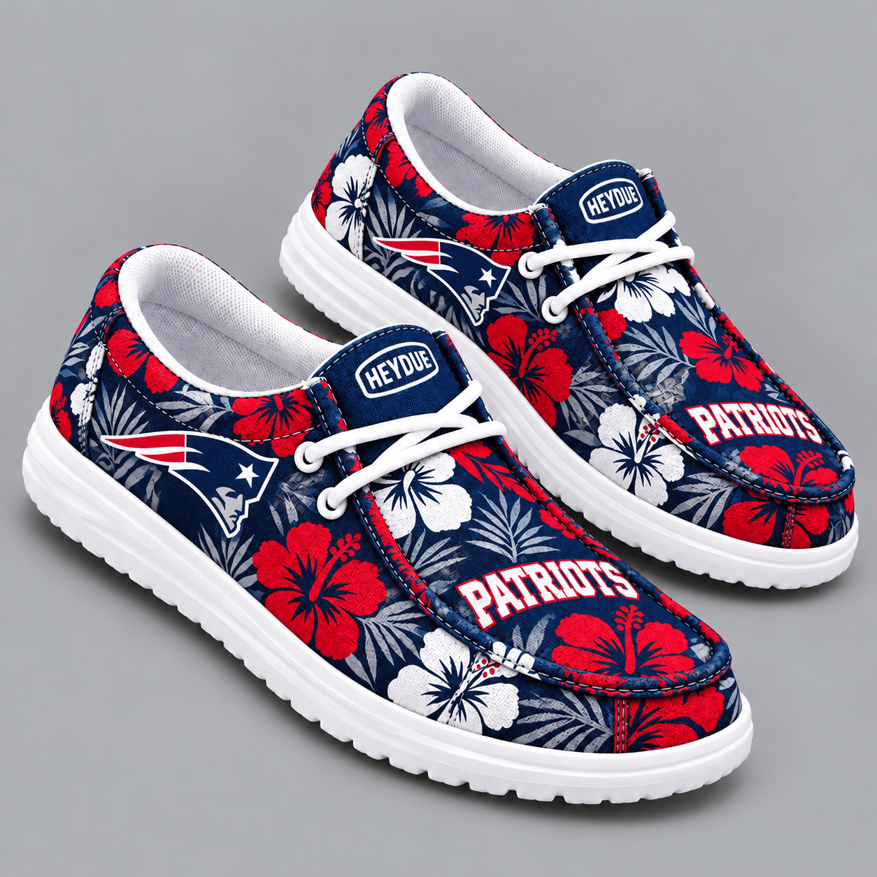 New England Patriots | Premium NFL Tropical Hibiscus Floral Print HEYDUDE Casual Loafers With Team Logo And Lightweight Comfort Sole NDN cover
