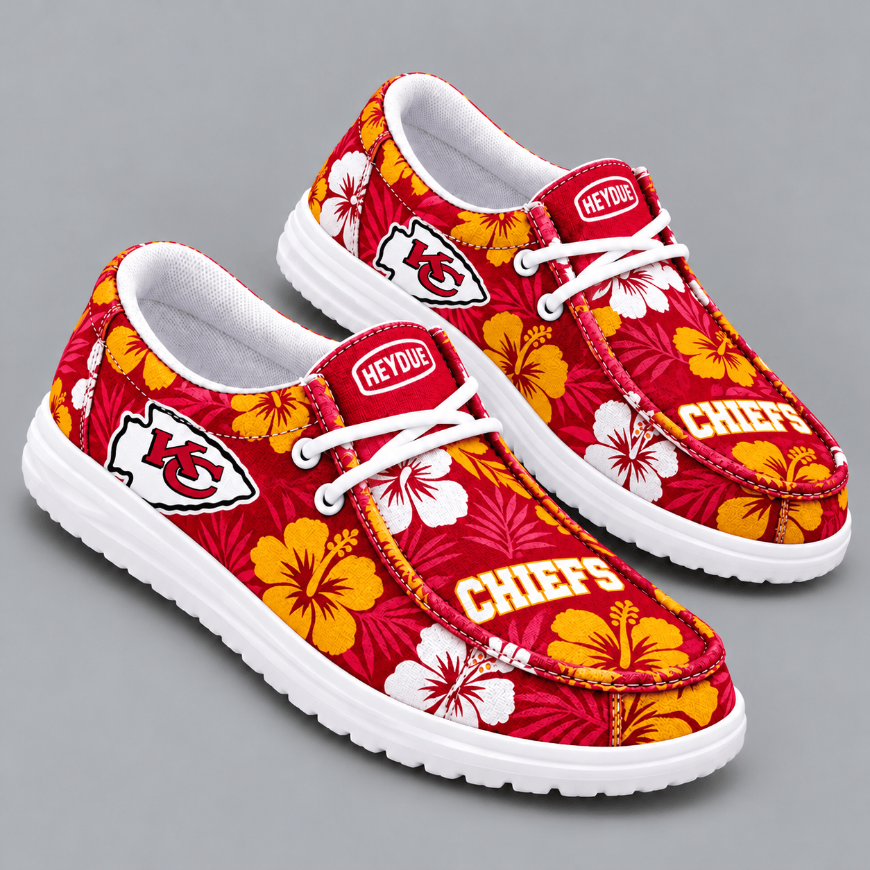 Kansas City Chiefs | Premium NFL Tropical Hibiscus Floral Print HEYDUDE Casual Loafers With Team Logo And Lightweight Comfort Sole NDN cover