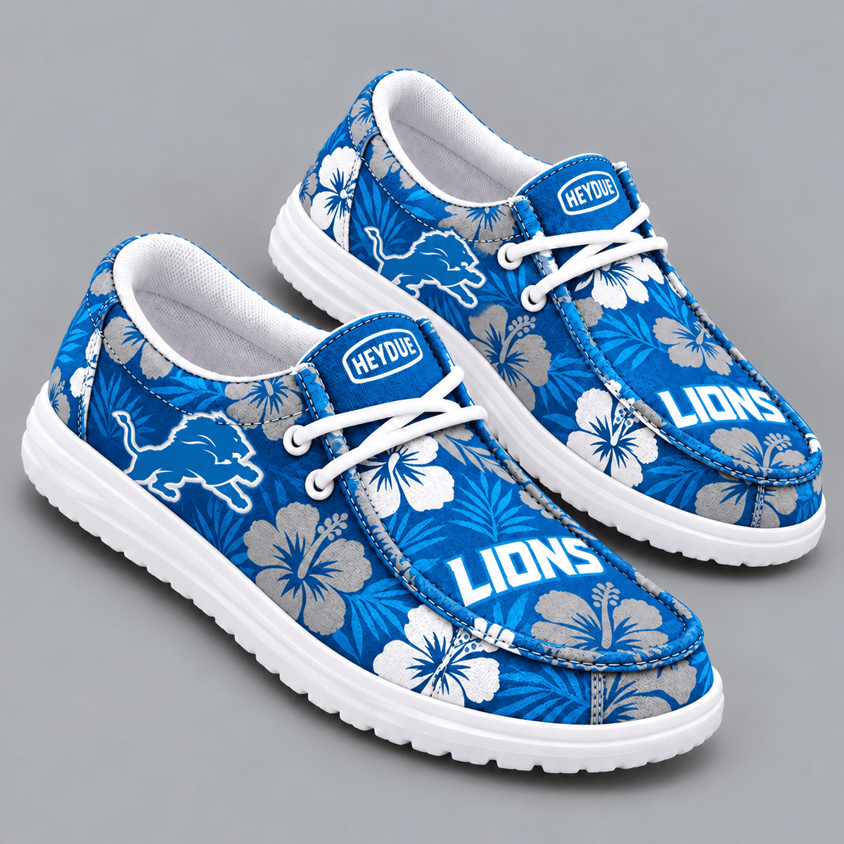 Detroit Lions | Premium NFL Tropical Hibiscus Floral Print HEYDUDE Casual Loafers With Team Logo And Lightweight Comfort Sole NDN cover