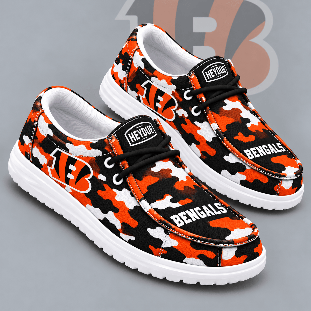 Cincinnati Bengals | Premium NFL Urban Camo Print HEYDUDE Casual Loafers With Team Logo And Lightweight Comfort Sole NDN cover