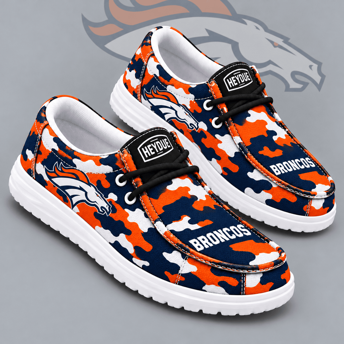 Denver Broncos | Premium NFL Urban Camo Print HEYDUDE Casual Loafers With Team Logo And Lightweight Comfort Sole NDN cover
