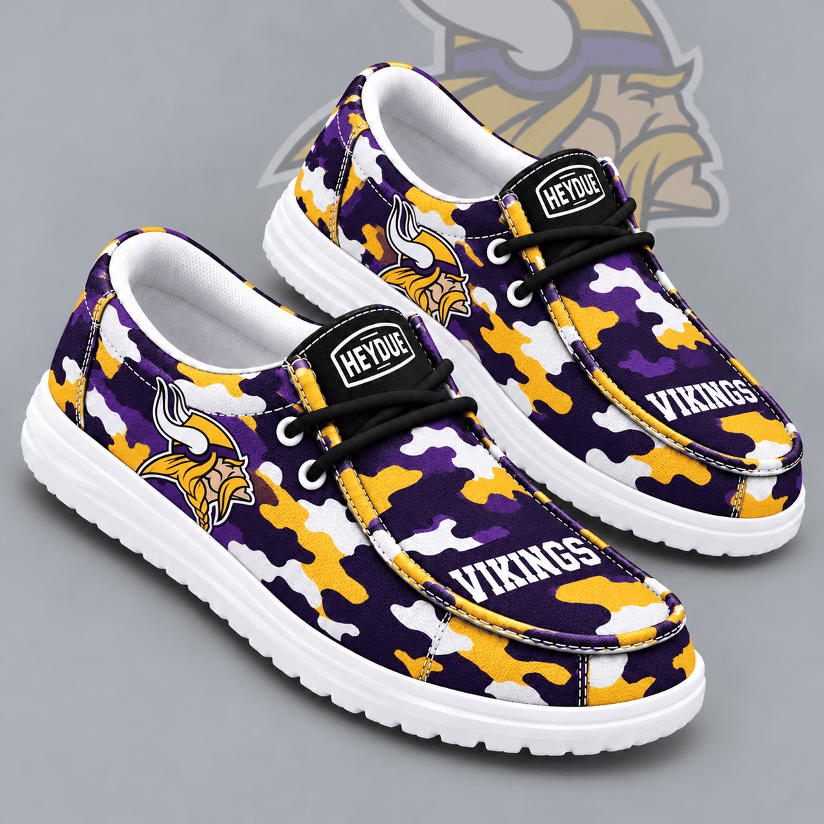 Minnesota Vikings | Premium NFL Urban Camo Print HEYDUDE Casual Loafers With Team Logo And Lightweight Comfort Sole NDN cover