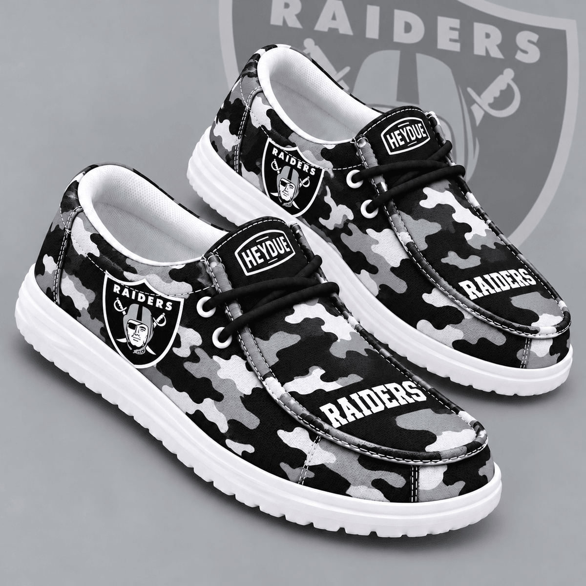 Las Vegas Raiders | Premium NFL Urban Camo Print HEYDUDE Casual Loafers With Team Logo And Lightweight Comfort Sole NDN cover