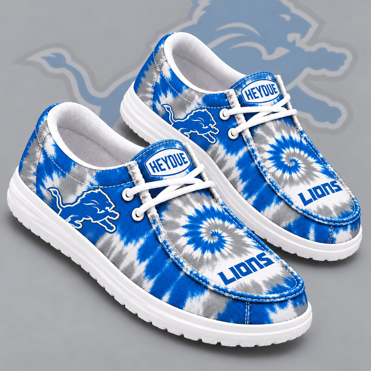 Detroit Lions | Premium NFL Spiral Tie Dye Print HEYDUDE Casual Loafers With Team Logo And Lightweight Comfort Sole NDN cover