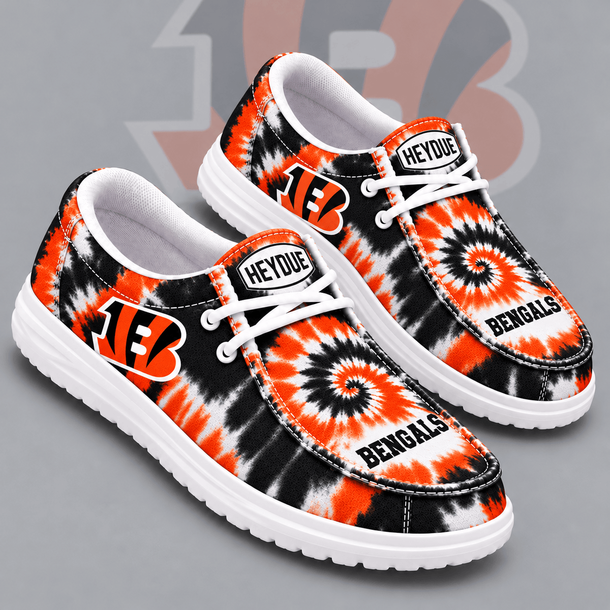 Cincinnati Bengals | Premium NFL Spiral Tie Dye Print HEYDUDE Casual Loafers With Team Logo And Lightweight Comfort Sole NDN cover