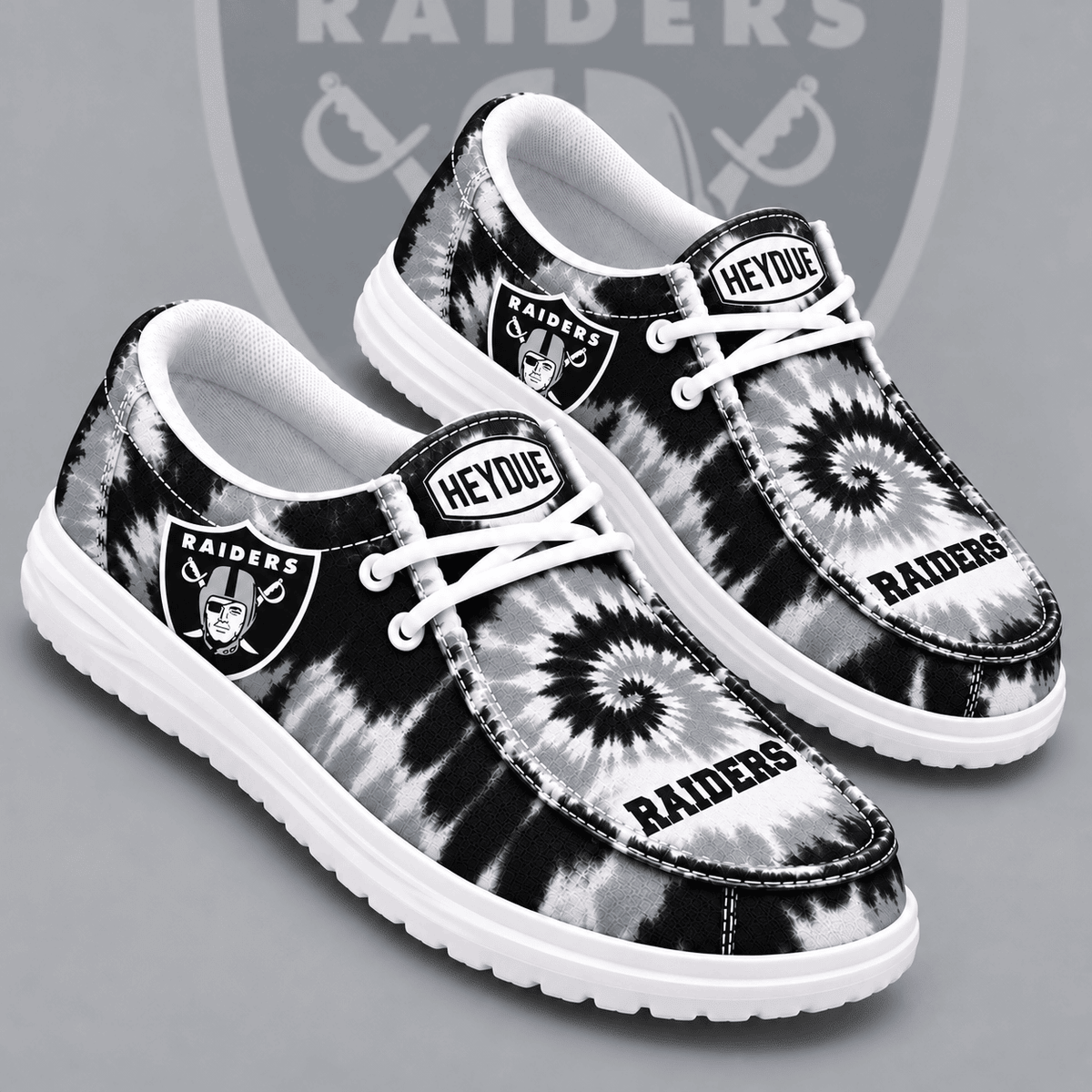 Las Vegas Raiders | Premium NFL Spiral Tie Dye Print HEYDUDE Casual Loafers With Team Logo And Lightweight Comfort Sole NDN cover