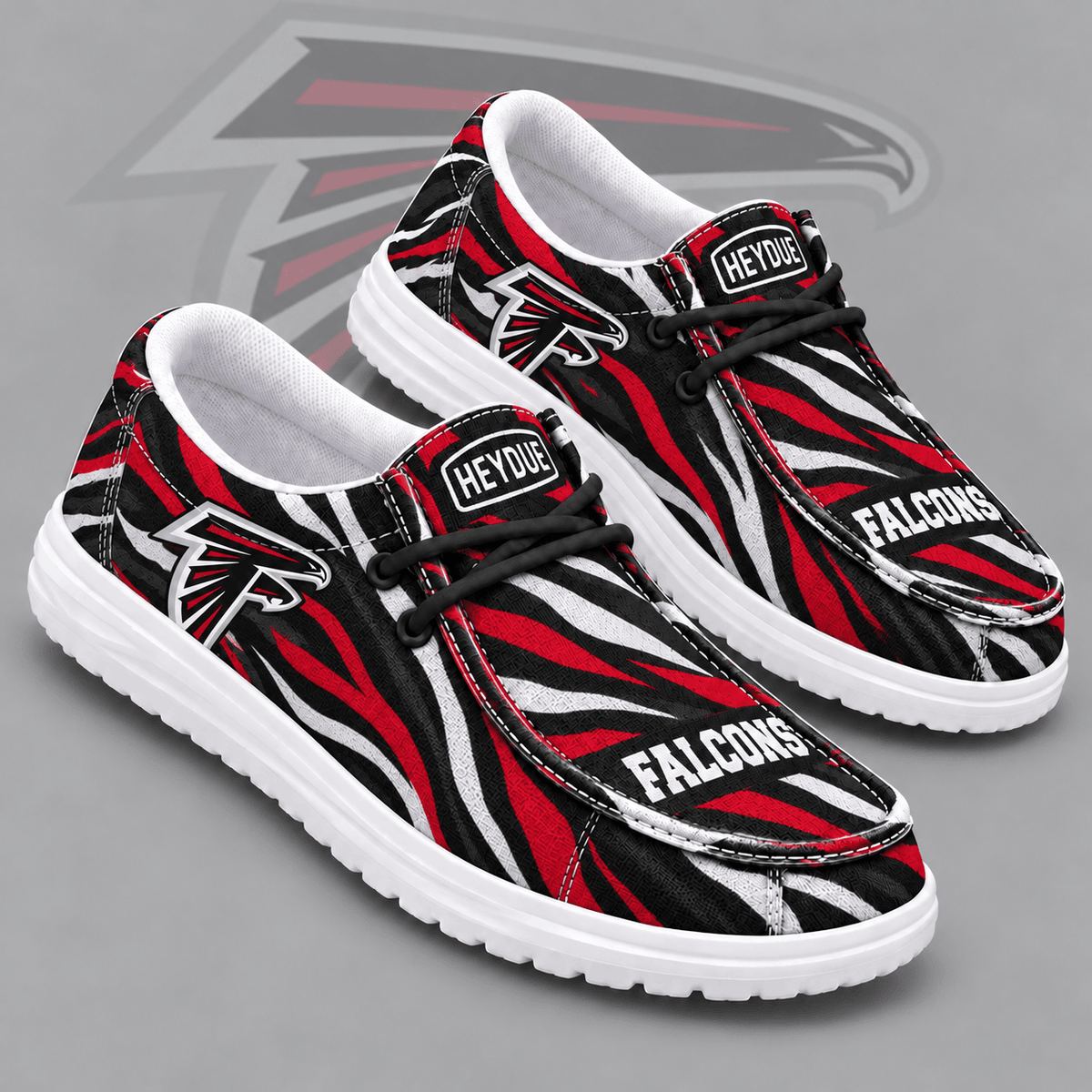 Atlanta Falcons | Premium NFL Wild Zebra Stripe Print HEYDUDE Casual Loafers With Team Logo And Lightweight Comfort Sole NDN cover