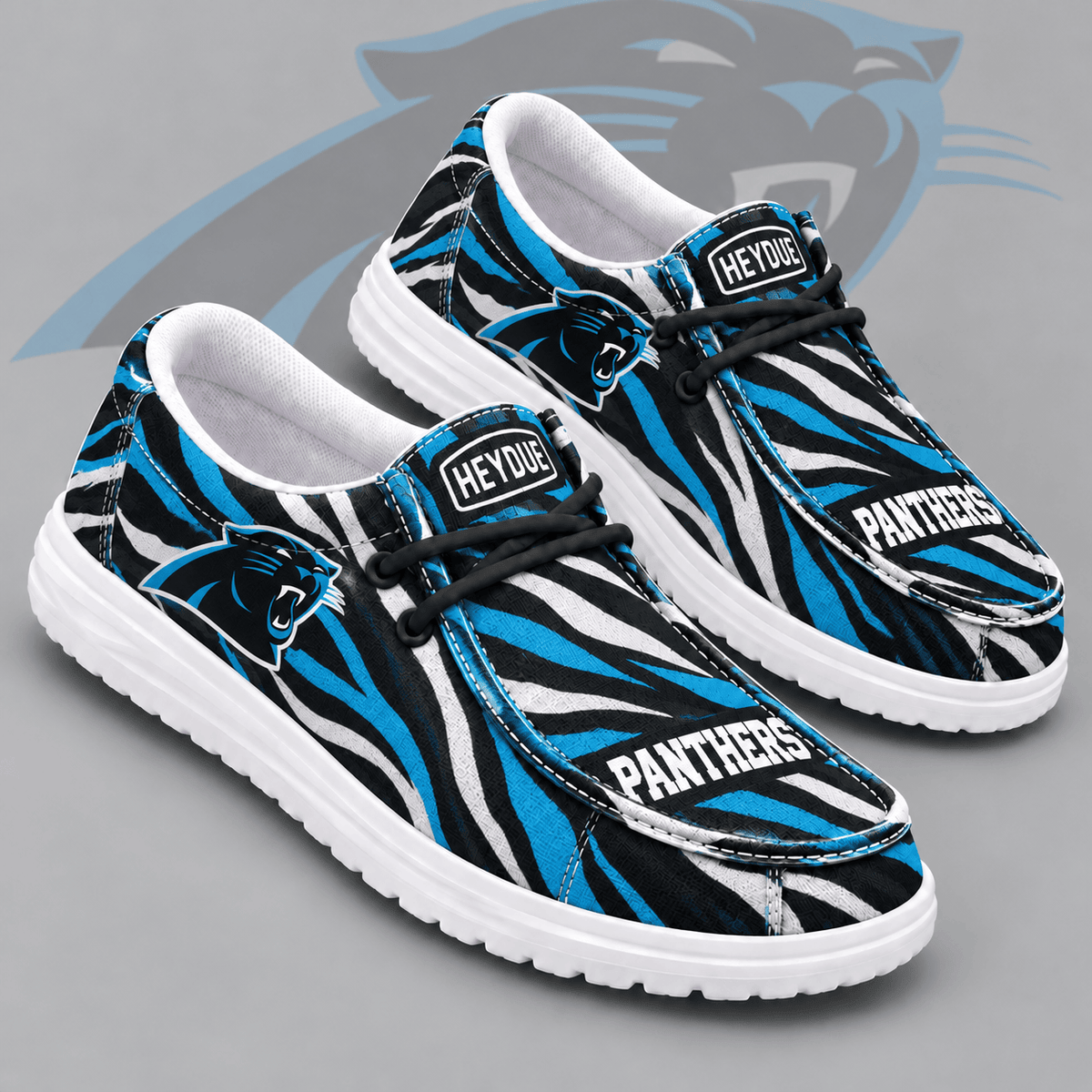Carolina Panthers | Premium NFL Wild Zebra Stripe Print HEYDUDE Casual Loafers With Team Logo And Lightweight Comfort Sole NDN cover