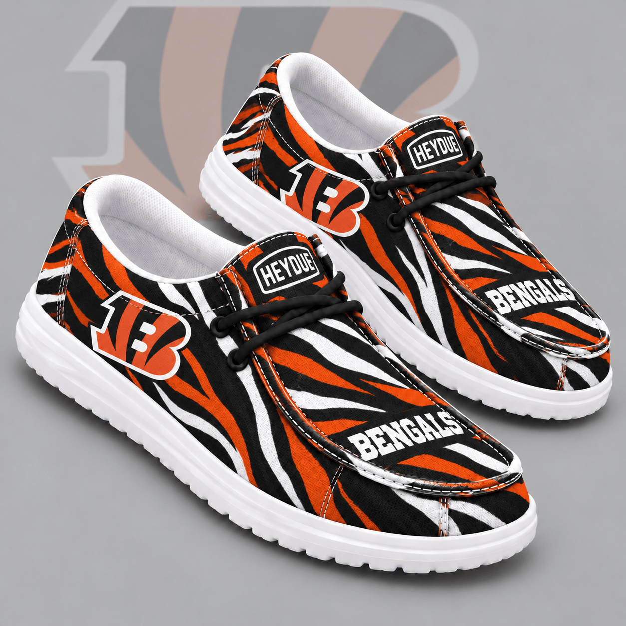 Cincinnati Bengals | Premium NFL Wild Zebra Stripe Print HEYDUDE Casual Loafers With Team Logo And Lightweight Comfort Sole NDN cover