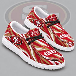 San Francisco 49ers | Premium NFL Wild Zebra Stripe Print HEYDUDE Casual Loafers With Team Logo And Lightweight Comfort Sole NDN cover