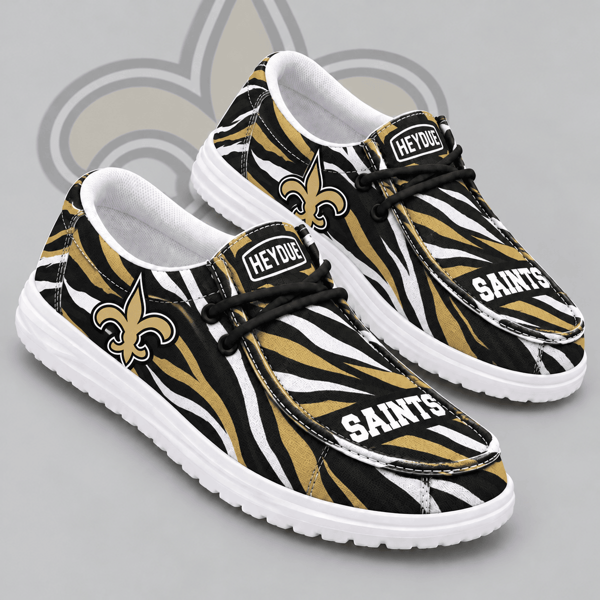 New Orleans Saints | Premium NFL Wild Zebra Stripe Print HEYDUDE Casual Loafers With Team Logo And Lightweight Comfort Sole NDN cover