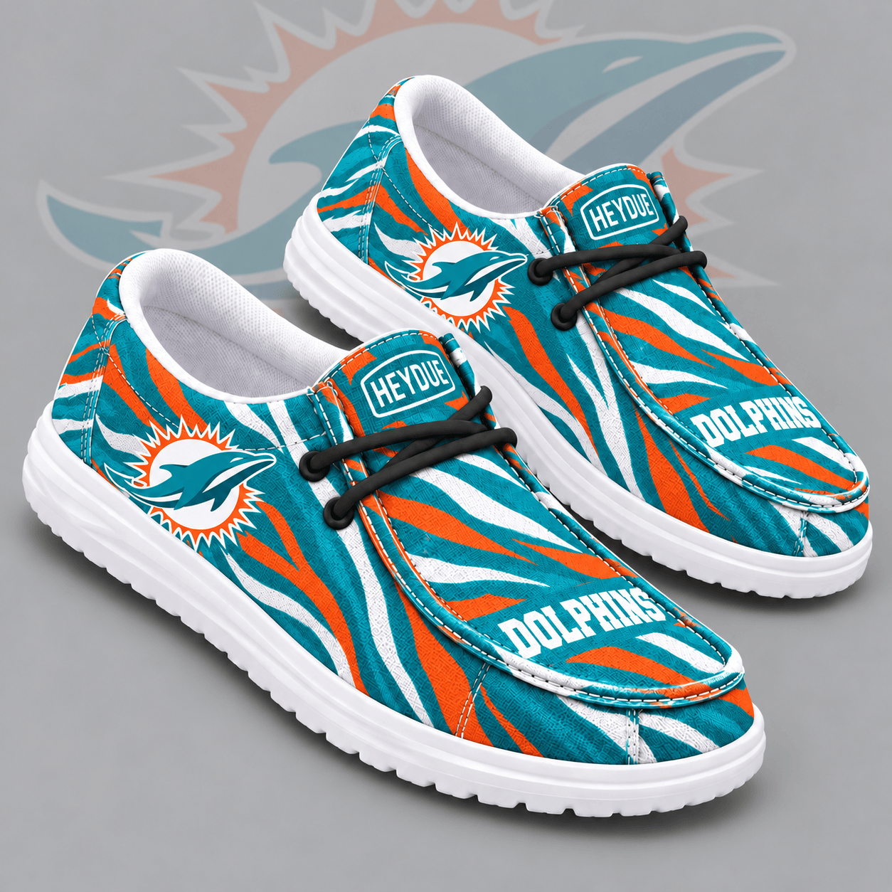 Miami Dolphins | Premium NFL Wild Zebra Stripe Print HEYDUDE Casual Loafers With Team Logo And Lightweight Comfort Sole NDN cover