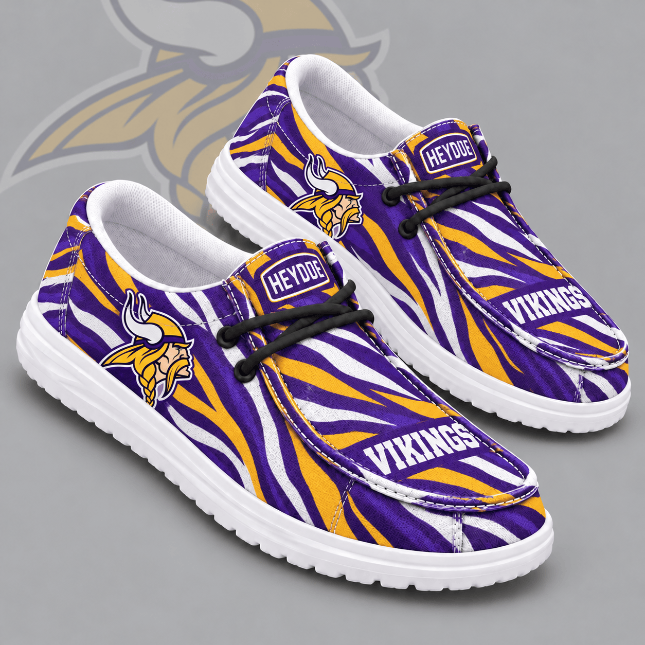 Minnesota Vikings | Premium NFL Wild Zebra Stripe Print HEYDUDE Casual Loafers With Team Logo And Lightweight Comfort Sole NDN cover