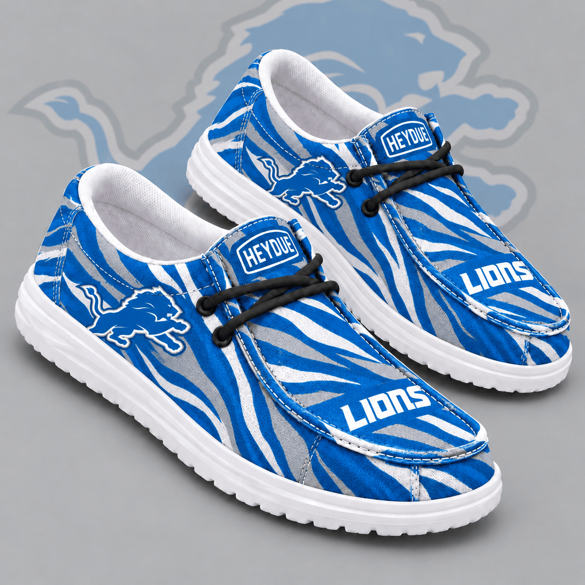 Detroit Lions | Premium NFL Wild Zebra Stripe Print HEYDUDE Casual Loafers With Team Logo And Lightweight Comfort Sole NDN cover