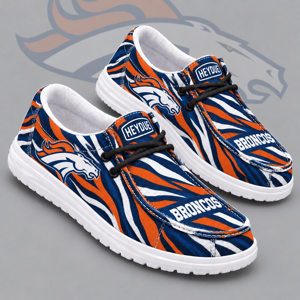 Denver Broncos | Premium NFL Wild Zebra Stripe Print HEYDUDE Casual Loafers With Team Logo And Lightweight Comfort Sole NDN cover