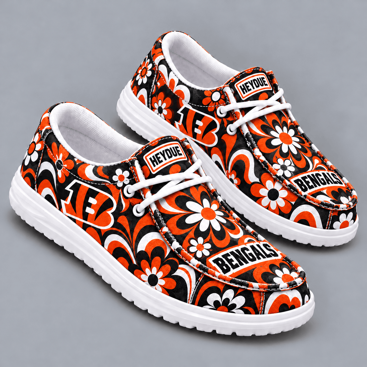 Cincinnati Bengals | Premium NFL Retro Groovy Floral Swirl Print HEYDUDE Casual Loafers With Team Logo And Lightweight Comfort Sole NDN cover