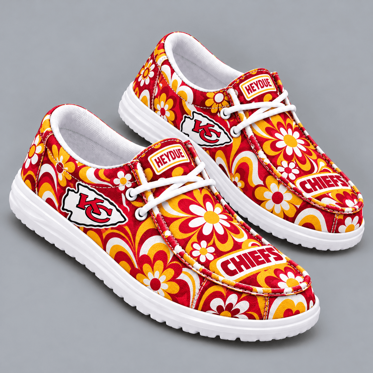 Kansas City Chiefs | Premium NFL Retro Groovy Floral Swirl Print HEYDUDE Casual Loafers With Team Logo And Lightweight Comfort Sole NDN cover