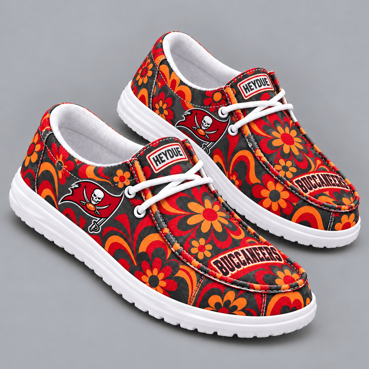 Tampa Bay Buccaneers | Premium NFL Retro Groovy Floral Swirl Print HEYDUDE Casual Loafers With Team Logo And Lightweight Comfort Sole NDN cover