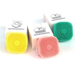 Shampoo-dispensing bath gloves for Golden Retrievers — yellow, pink and green bath brushes with their boxes