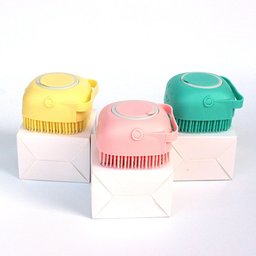 Shampoo-dispensing bath gloves for Golden Retrievers — yellow, pink and teal bath brushes on their boxes