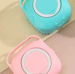 Shampoo-dispensing bath gloves for Golden Retrievers — teal and pink bath brushes, top view