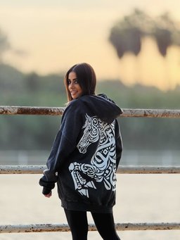 Asil hoodie styled in Egypt – Arabian horse in Arabic calligraphy on the back (QADIM washed-black edition)