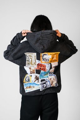 Tawabie hoodie styled in Egypt – vintage Egyptian postage stamp collage on the back (QADIM washed-black edition)