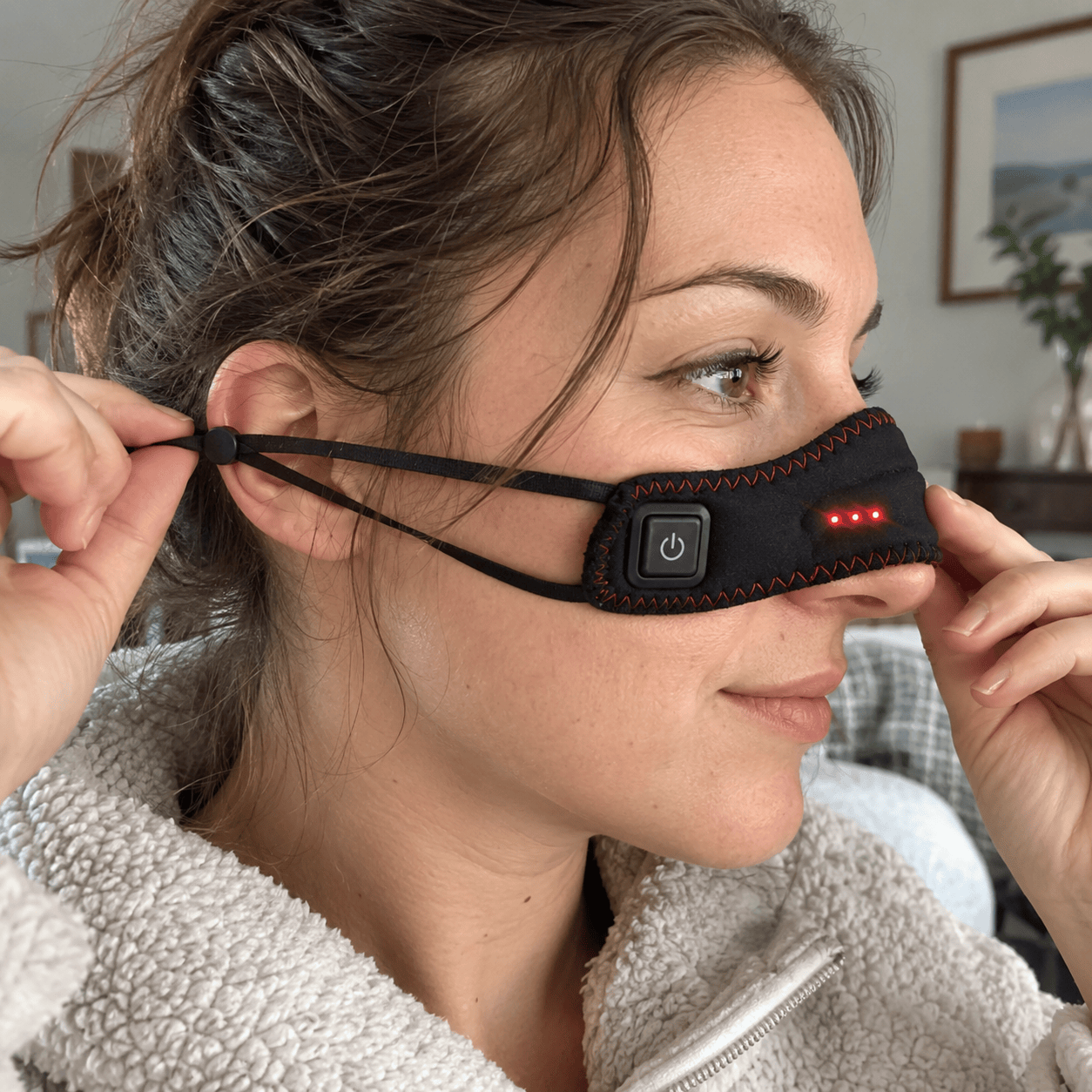 Side view showing the nose warmer strap and fit