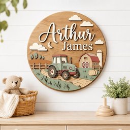 May include: A circular wooden wall sign featuring the name Arthur James in white script and block lettering. The design includes a layered 3D scene of a green tractor, a red-roofed barn, a wooden fence, hay bales, and white clouds against a wood grain.