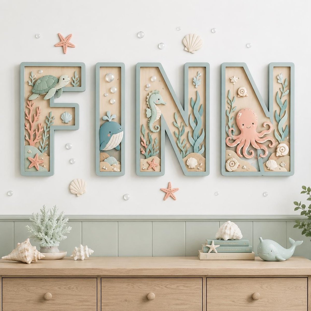 May include: Four wall-mounted wooden letters spelling FINN, each featuring a light blue frame and a light wood interior. The letters are decorated with three-dimensional sea creatures including a turtle, whale, seahorse, and octopus.