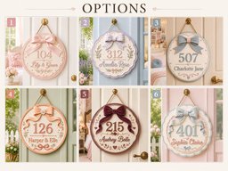 May include: Six circular hanging door signs featuring bows, numbers, and names. Option 1: pink with 104, Lily & Grace. Option 2: lavender with 312, Amelia Rose. Option 3: blue with 507, Charlotte Jane. Option 4: peach with 126, Harper & Elle. Option 5: maroon with 215, Audrey Belle. Option 6: light blue with 401, Sophia Claire.