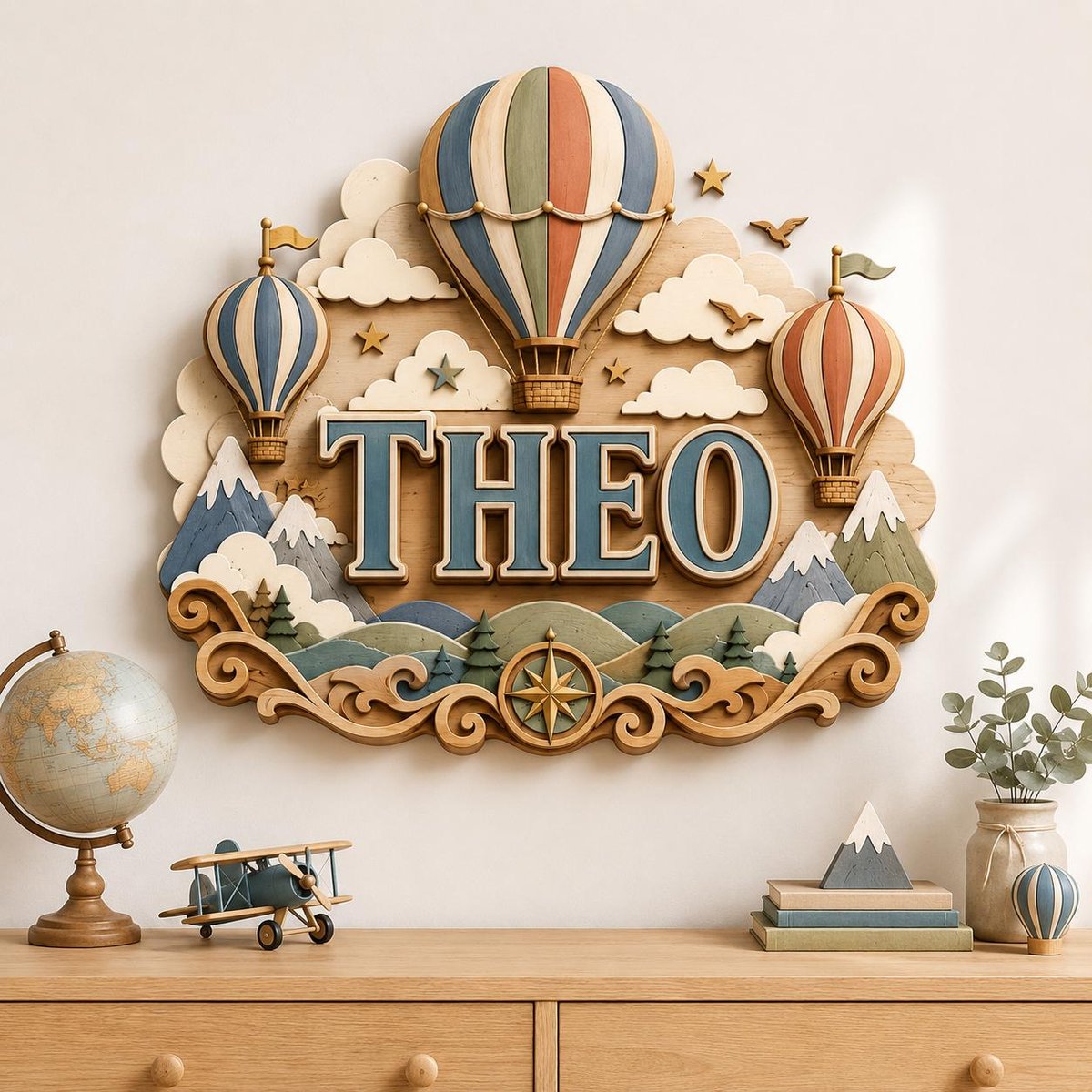 May include: A wooden wall sign featuring the name THEO in large blue letters, surrounded by three hot air balloons, clouds, mountains, and a compass rose. The design includes small stars and birds in a layered, multi-colored wood construction.