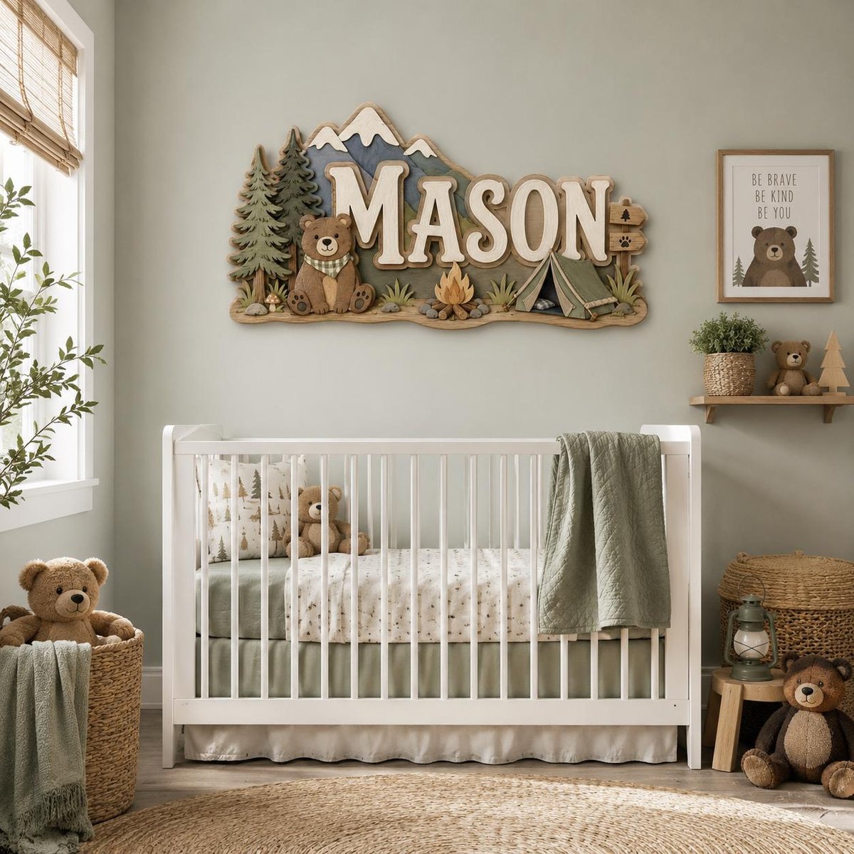 May include: A wooden wall sign featuring the name MASON in large white letters, decorated with a brown bear, green pine trees, a campfire, and a tent. The sign has a mountain backdrop in shades of blue and tan, creating a layered outdoor scene.